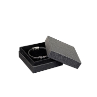 Écrin bague carton aspect grainé noir, rebord intérieur aspect suédine