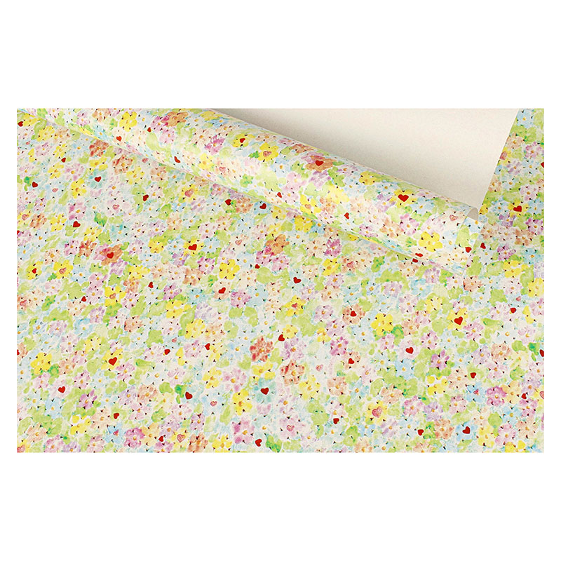 Papier cadeau recyclé fond blanc, petites fleurs colorées et coeurs 0,70 x 25m