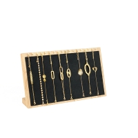 Présentoir bracelets/colliers en hêtre et suédine synthétique noire H 18cm - 18 crochets dorés