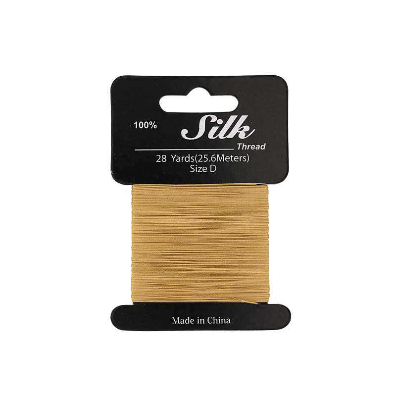 Gold-coloured silk beading thread, 0.3mm diametre (size D) 25m