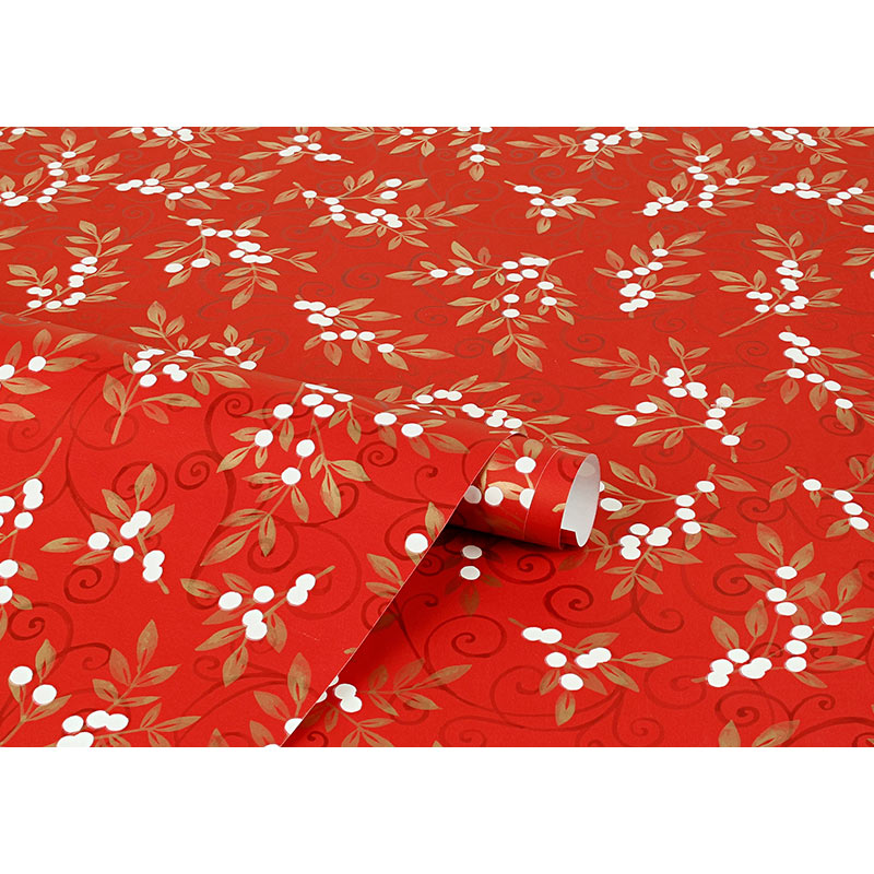 Red festive wrapping paper with arabesques and mistletoe motifs