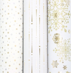 White gift wrapping paper printed with gold metallic shooting stars, 0.70 x 25m