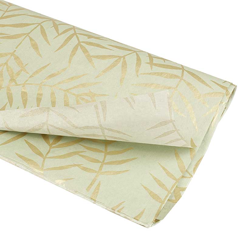 Green background tissue paper with gold foliage motifs