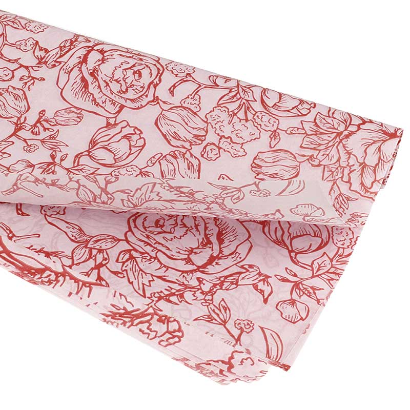 Pink tissue paper with red rose print
