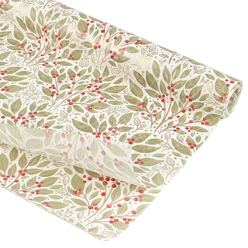 Seasonal cream background tissue paper with green and red holly motifs