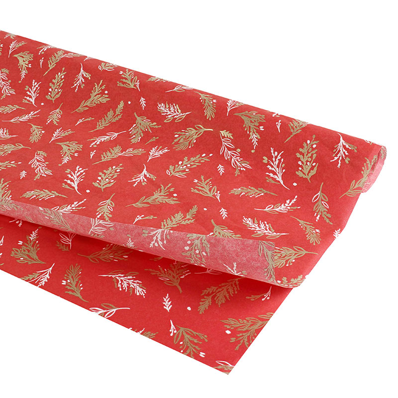 Seasonal red tissue paper with gold mistletoe motifs