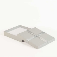 Card jewellery presentation box decorated with satin ribbon