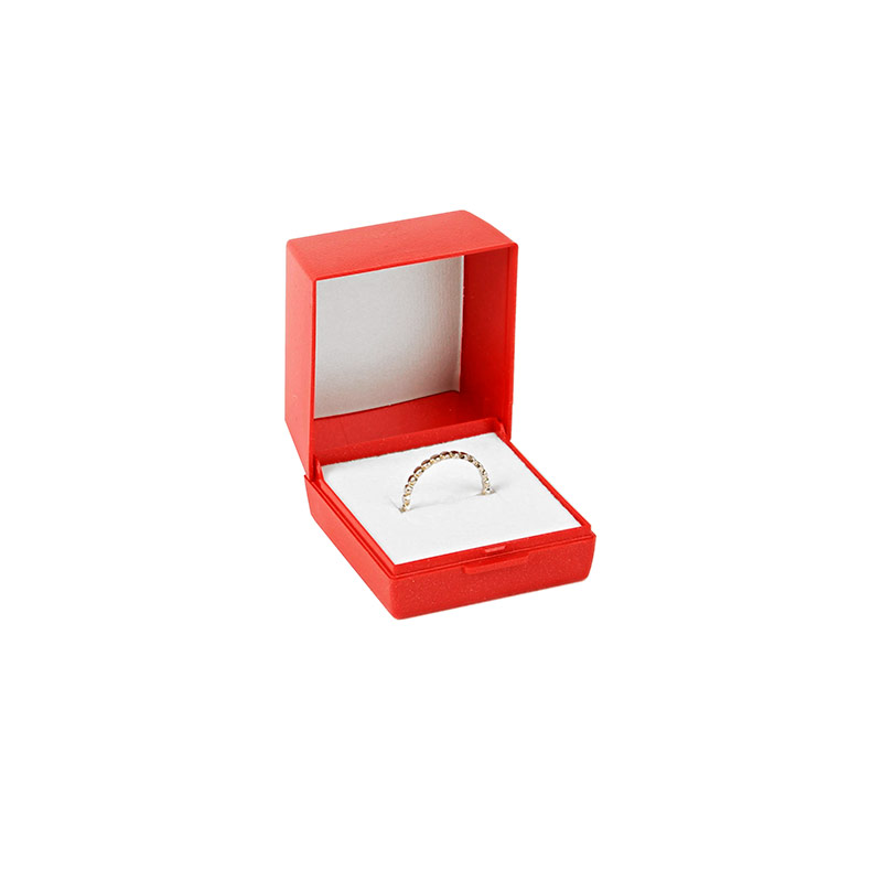 Red textured plastic ring box with hinge and gold border