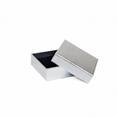 Textured and smooth shiny gold-coloured card ring/universal box