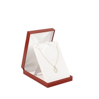 Classic red leatherette jewellery presentation box with gold border