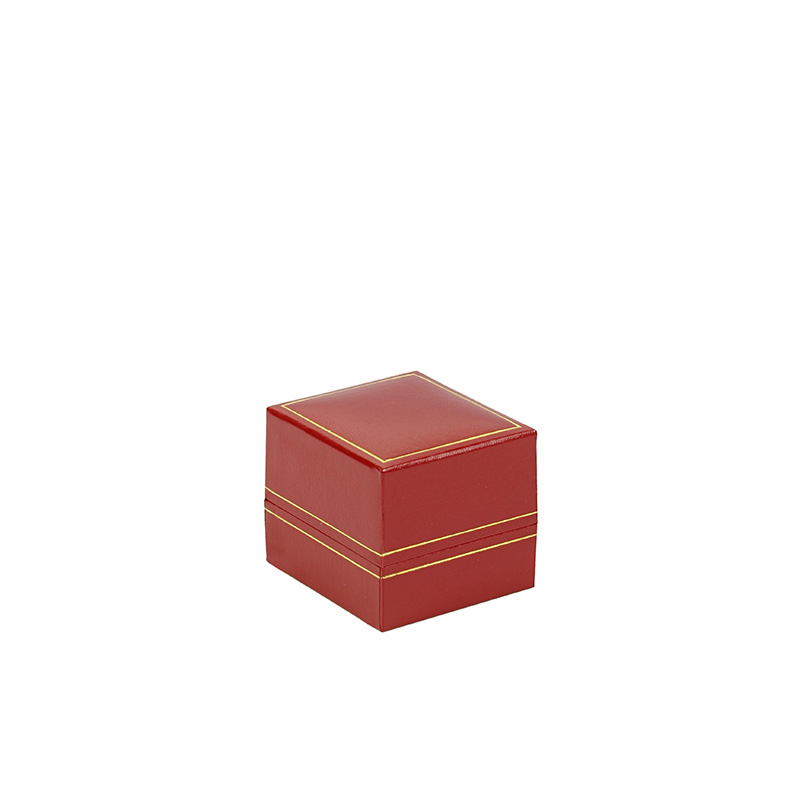 Red leatherette ring box with tab and gold border