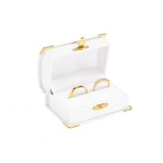 White leatherette box with gold edging for pair of wedding rings