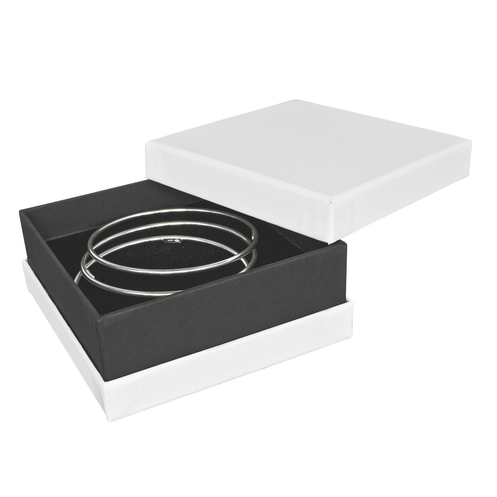 White matt finish universal box with black contrasting centre