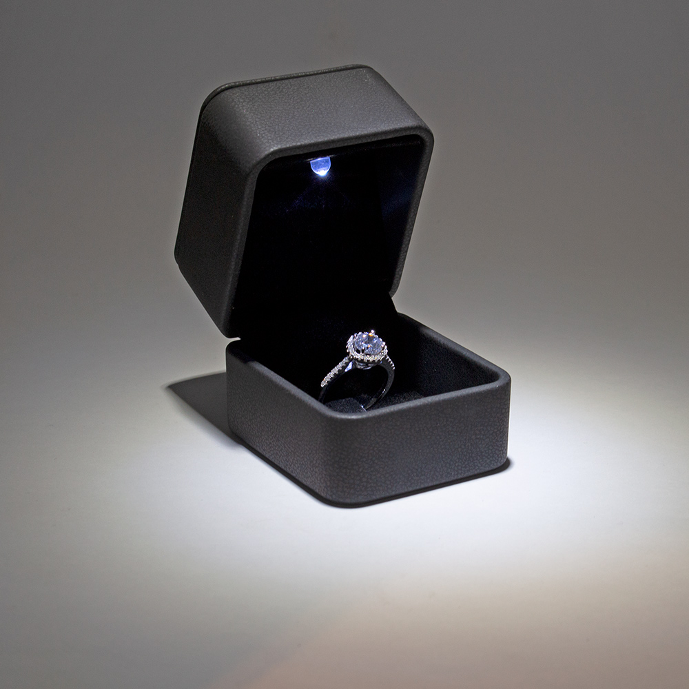 Imitation kidskin ring boxes with top stitching and interior LED light