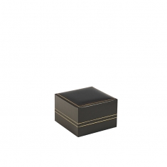 Black leatherette watch box with a gold border