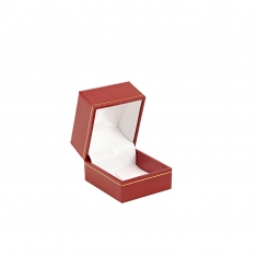Red leatherette ring box with tab and gold border