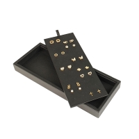 Black man-made smooth finish leatherette display for 16 pairs of stud earrings, 10 x 25 cm