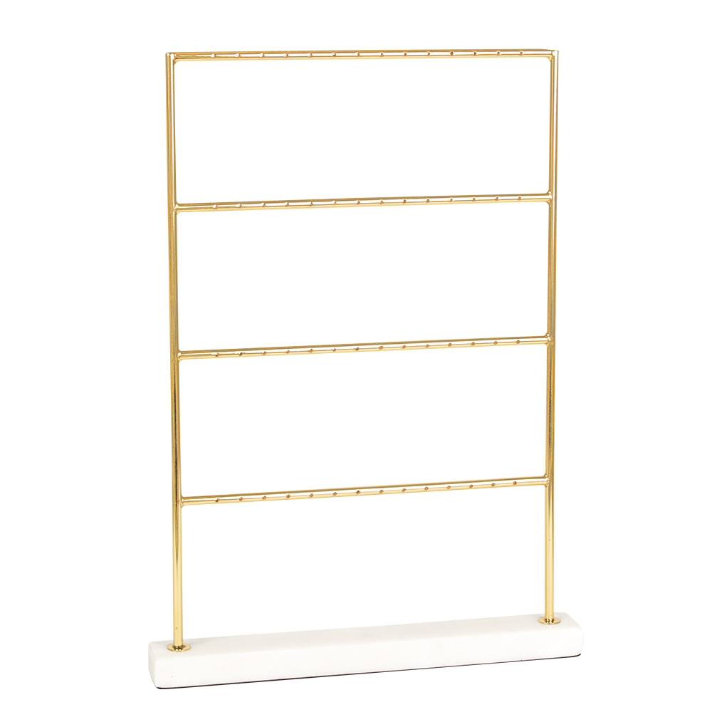 Gold-coloured metal earring display rack with marble base