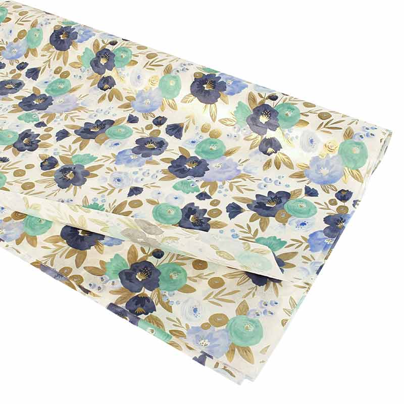 White tissue paper with blue floral motifs