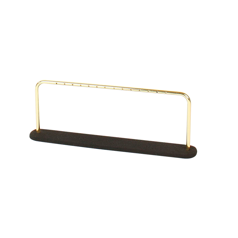 Shiny gold-coloured metal display for 7 pairs of earring with black granite finish base