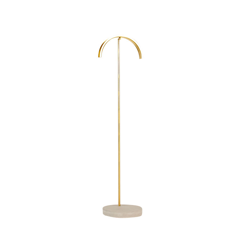 Matt finish gold-coloured metal necklace display with curved top and concrete base 42 cm