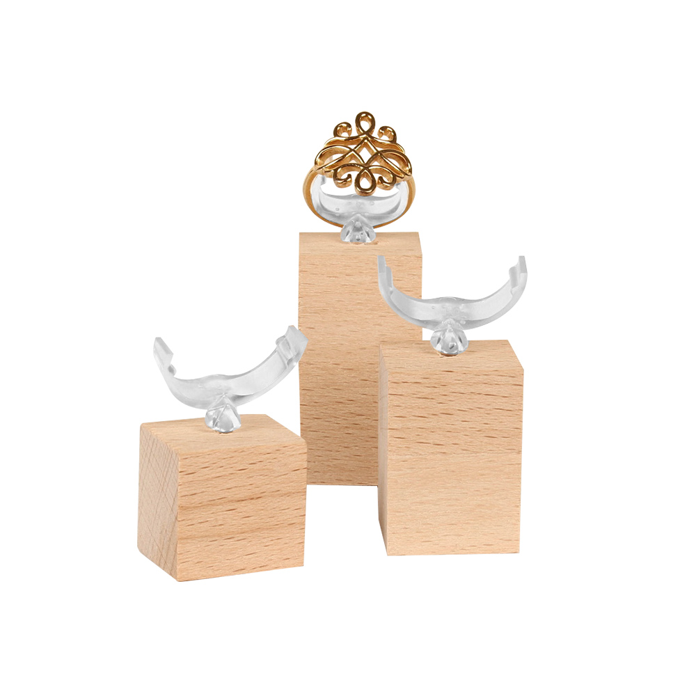 Set of three ring holders with beech wood base and transparent ring clips