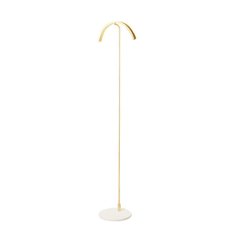 Tall curved brass finish metal necklace display with round white granite look base, 57 cm H