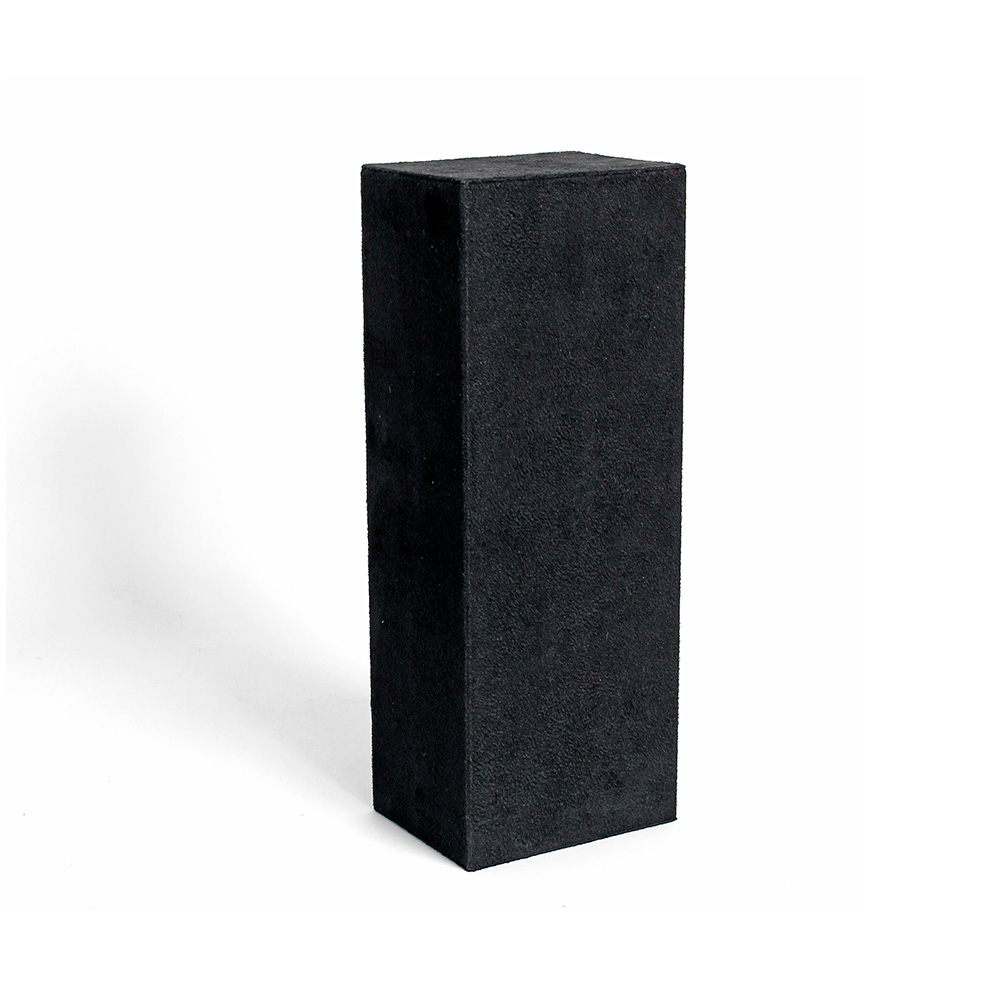 Tall display riser covered in black man-made suedette 9 x 7 x 24cm
