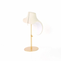 Adjustable cream coloured suedette display bust with matt finish gold metal foot, 19 to 27 cm tall
