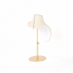 Adjustable cream coloured suedette display bust with matt finish gold metal foot, 18 to 25 cm tall