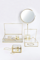 Small glass and brass display box with inclined lid - mirror base